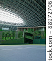 Unmanned tennis courts and spectators' seats in the arena 88972706