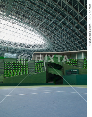 Unmanned tennis courts and spectators' seats in the arena Unmanned tennis courts and spectators' seats in the arena 88972706