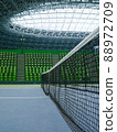 Unmanned tennis courts and spectators' seats in the arena 88972709