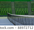 Unmanned tennis courts and spectators' seats in the arena 88972712