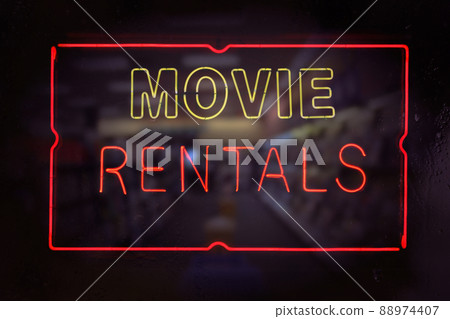 Neon Movie Rentals Sign in Wet Rainy Window Neon Movie Rentals Sign in Wet Rainy Window 88974407