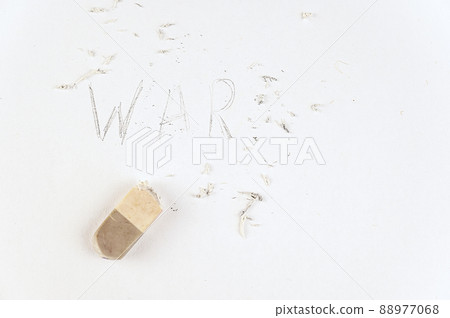 Half-erased with an eraser is the word WAR. Handwritten word on white paper. Half-erased with an eraser is the word WAR. Handwritten word on white paper. 88977068