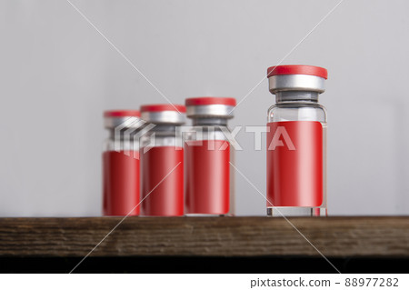 Medical vial for injection isolated on gray background mock-up series Medical vial for injection isolated on gray background mock-up series 88977282