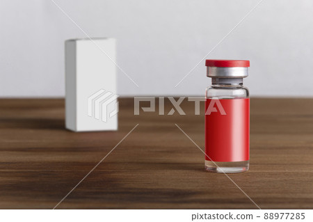 Medical vial for injection on wooden board background mock-up series Medical vial for injection on wooden board background mock-up series 88977285