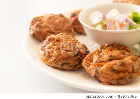 Thai fish cakes with dipping sauce Thai fish cakes with dipping sauce 88978369