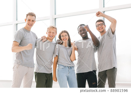 happy young business team standing in new office happy young business team standing in new office 88981596