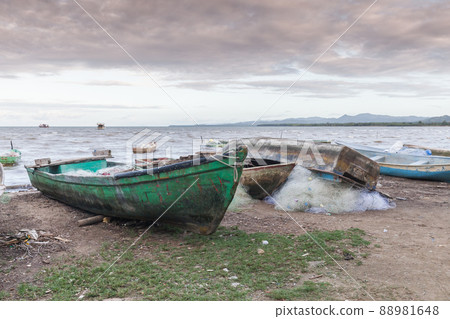 Fishing boats lay on the coast of Samana Bay Fishing boats lay on the coast of Samana Bay 88981648