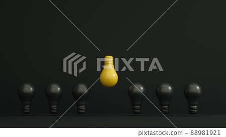 Yellow bulb inverted and higher among black bulbs on dark background. Leadership, authority, great idea concepts.  88981921