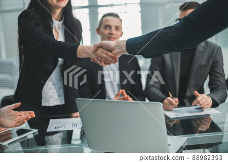 business colleagues greeting each other at an office meeting. business colleagues greeting each other at an office meeting. 88982393