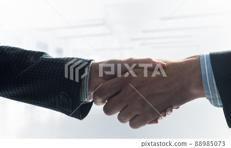 Close-up of the handshake of businessmen. 88985073