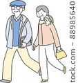 Elderly men and women walking 88985640