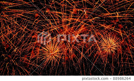 Festive grandiose fireworks festival against the background of the night sky. Multicolored motion blur splashes of fire . Pyrotechnics. Festive grandiose fireworks festival against the background of the night sky. Multicolored motion blur splashes of fire . Pyrotechnics. 88986264