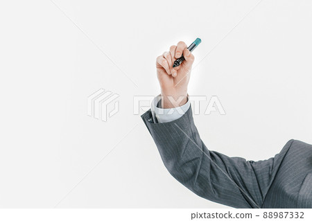 businessman pointing with a marker on the virtual point. 88987332