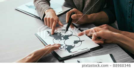 Elements of this image furnished by NASA. business colleagues discussing new logistics schemes. 88988346