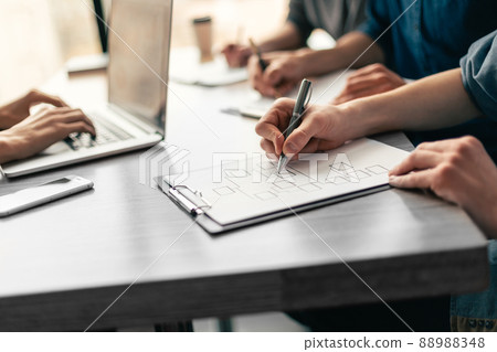 close up. working group works with marketing schedules. 88988348