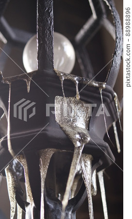 Lighting where the glass melted down in a fire 88988896