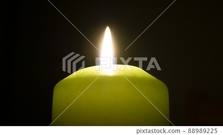 Candle flame in the dark_01 Candle flame in the dark_01 88989225