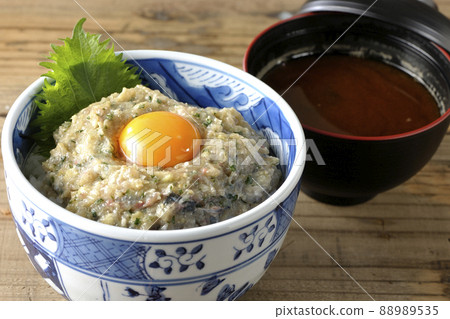 Namero bowl of horse mackerel topped with egg yolk and red miso soup 88989535