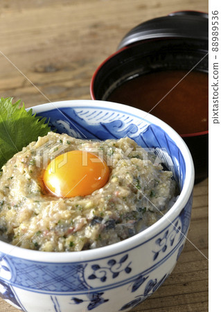 Namero bowl of horse mackerel topped with egg yolk and red miso soup 88989536