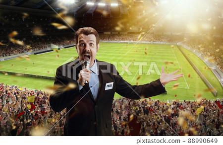Goal. Excited man, professional sport commentator having online broadcast of football match isolated over sport stadium background Goal. Excited man, professional sport commentator having online broadcast of football match isolated over sport stadium background 88990649