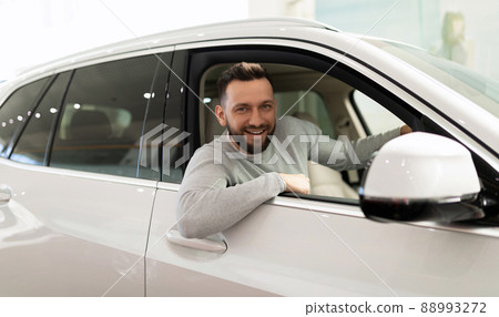 a buyer in a car showroom bought a new car and immediately insured it 88993272