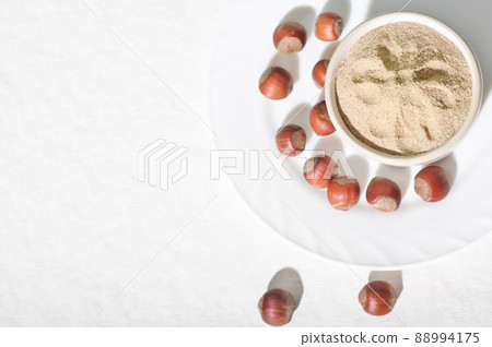 Bowl with hazelnut flour on table, top view. gluten free low carbohydrate diet 88994175