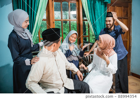 a family joy during idul fitri celebration a family joy during idul fitri celebration 88994354