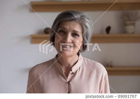 Head shot portrait of good-looking elegant middle-aged woman 89001707