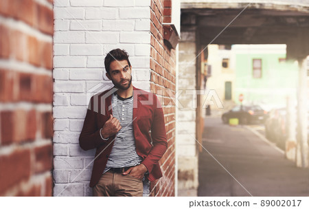 Looking good. Cropped shot of a stylish man standing in the city. 89002017