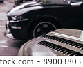 fixing your car at the garage by a mechanic 89003803