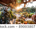 beautiful italian terrace with view on a magical garden during sunset 89003807