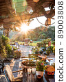 beautiful italian terrace with view on a magical garden during sunset 89003808
