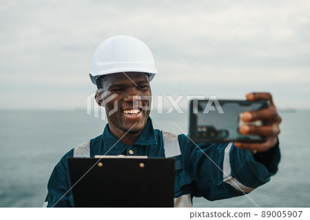 Bosun or seaman officer having videocall with family Bosun or seaman officer having videocall with family 89005907