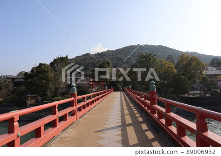 A landscape with a blue sky, a white sky, mountains, a vermilion torii gate, a bridge, and a river A landscape with a blue sky, a white sky, mountains, a vermilion torii gate, a bridge, and a river 89006932