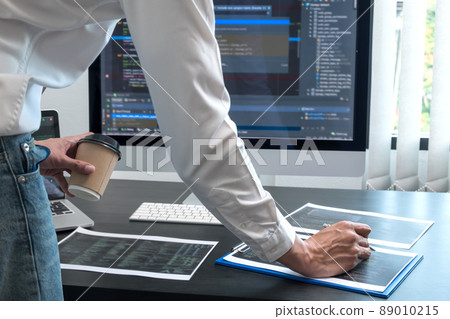 Programmer, Man working with computer programming, professional development, and coding technology, working on high-quality visual software development websites 89010215