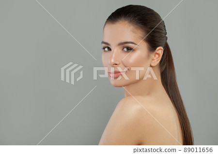 Beautiful brunette woman on white background 89011656