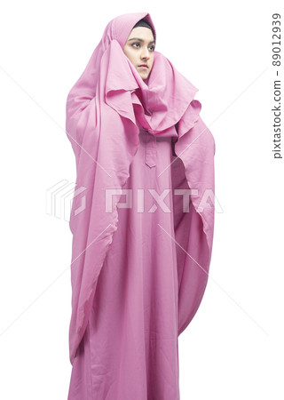 Asian Muslim woman in veil in praying position (salat) Asian Muslim woman in veil in praying position (salat) 89012939
