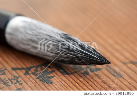 closeup writing brush 89012990