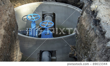two blue valves for water supply in the new sewer well two blue valves for water supply in the new sewer well 89013344