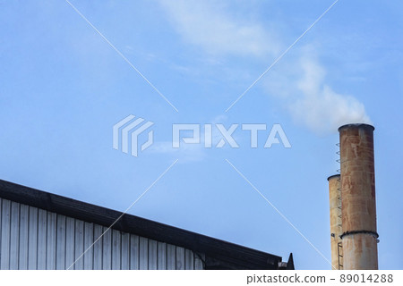 The chimney from the palm oil factory The chimney from the palm oil factory 89014288