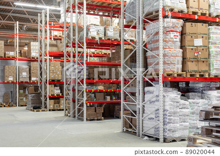 large warehouse with aluminum shelving system and cardboard boxes large warehouse with aluminum shelving system and cardboard boxes 89020044