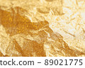 Wrinkled gold glitter texture 89021775