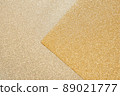 Overlapping gold glitter paper 89021777