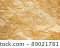 Wrinkled gold glitter texture 89021781