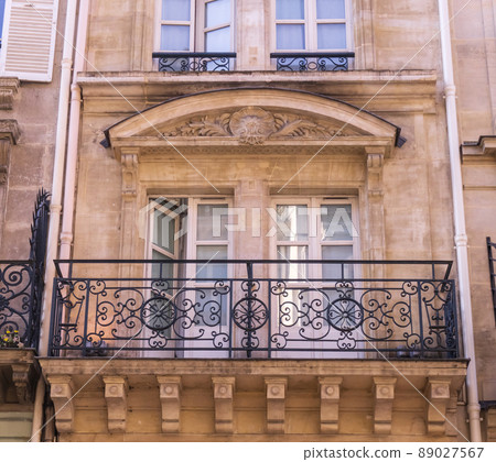 Parisian windows and balconies on a sunny day 89027567