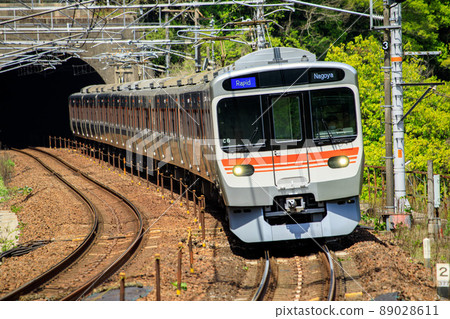 JR Tokai 315 series train running near Kokokei Station on the Chuo Line 89028611