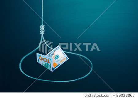 Trapped concept. US 100 dollar bill in a loop as a bait. Investment risk or money trap, business Trapped concept. US 100 dollar bill in a loop as a bait. Investment risk or money trap, business 89028865