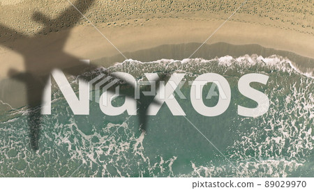 Naxos text revealed with the shadow of a flying commercial plane on the beach, aerial top-down view Naxos text revealed with the shadow of a flying commercial plane on the beach, aerial top-down view 89029970