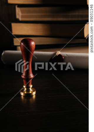 Vertical image of old notarial wax seal and document. Law concept 89031146