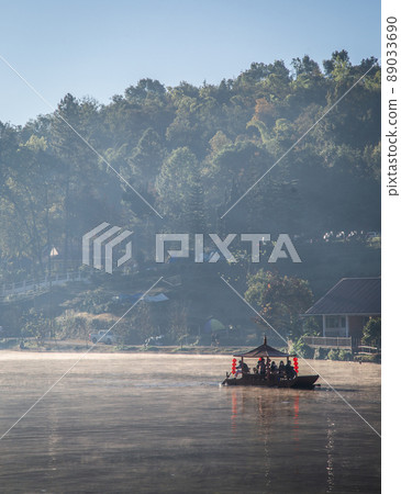 Sunrise with fog over Ban Rak thai, chinese village near a lake in Mae Hong Son, Thailand Sunrise with fog over Ban Rak thai, chinese village near a lake in Mae Hong Son, Thailand 89033690